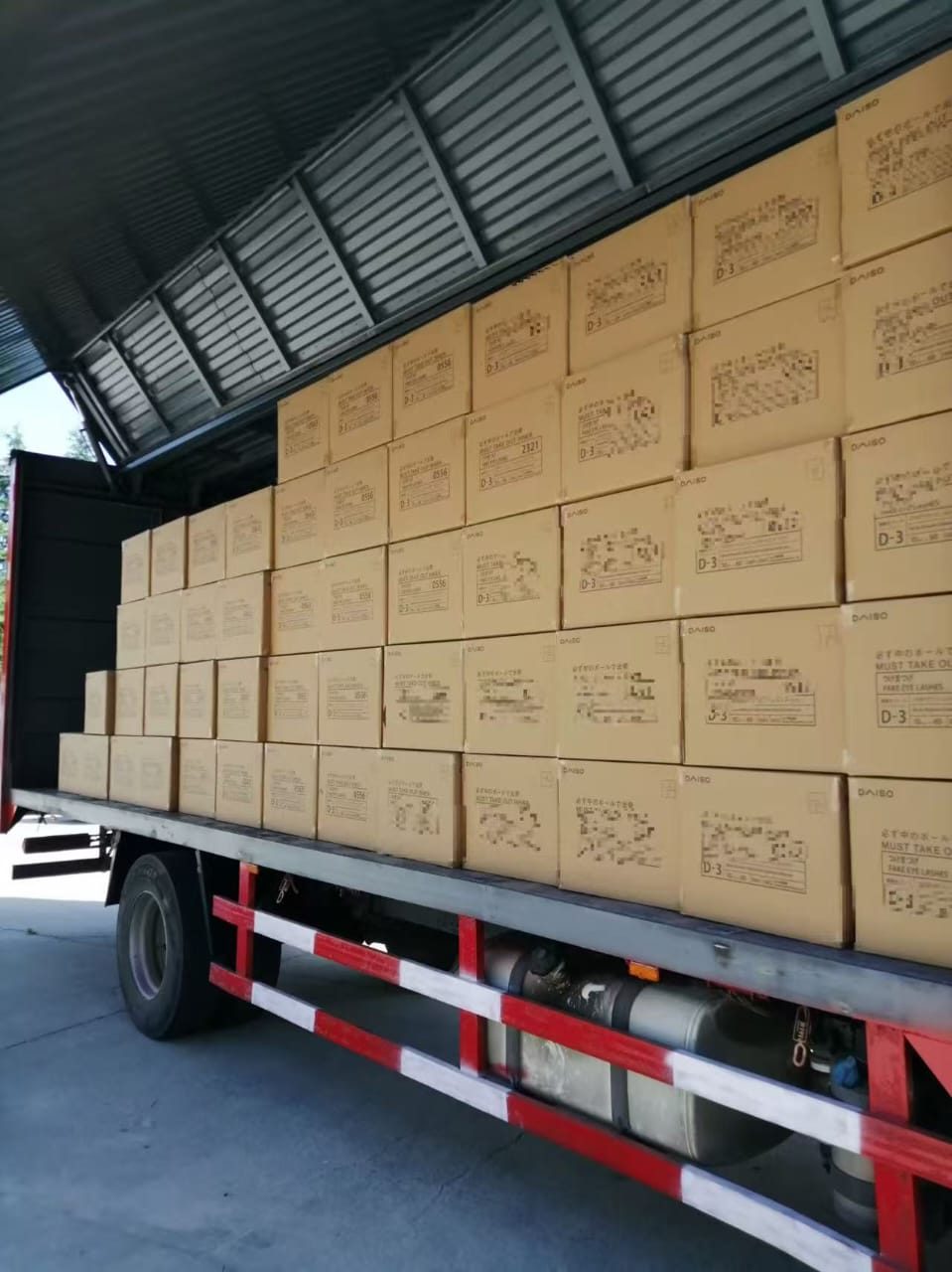 Truck loaded with export cartons of false eyelashes ready to ship