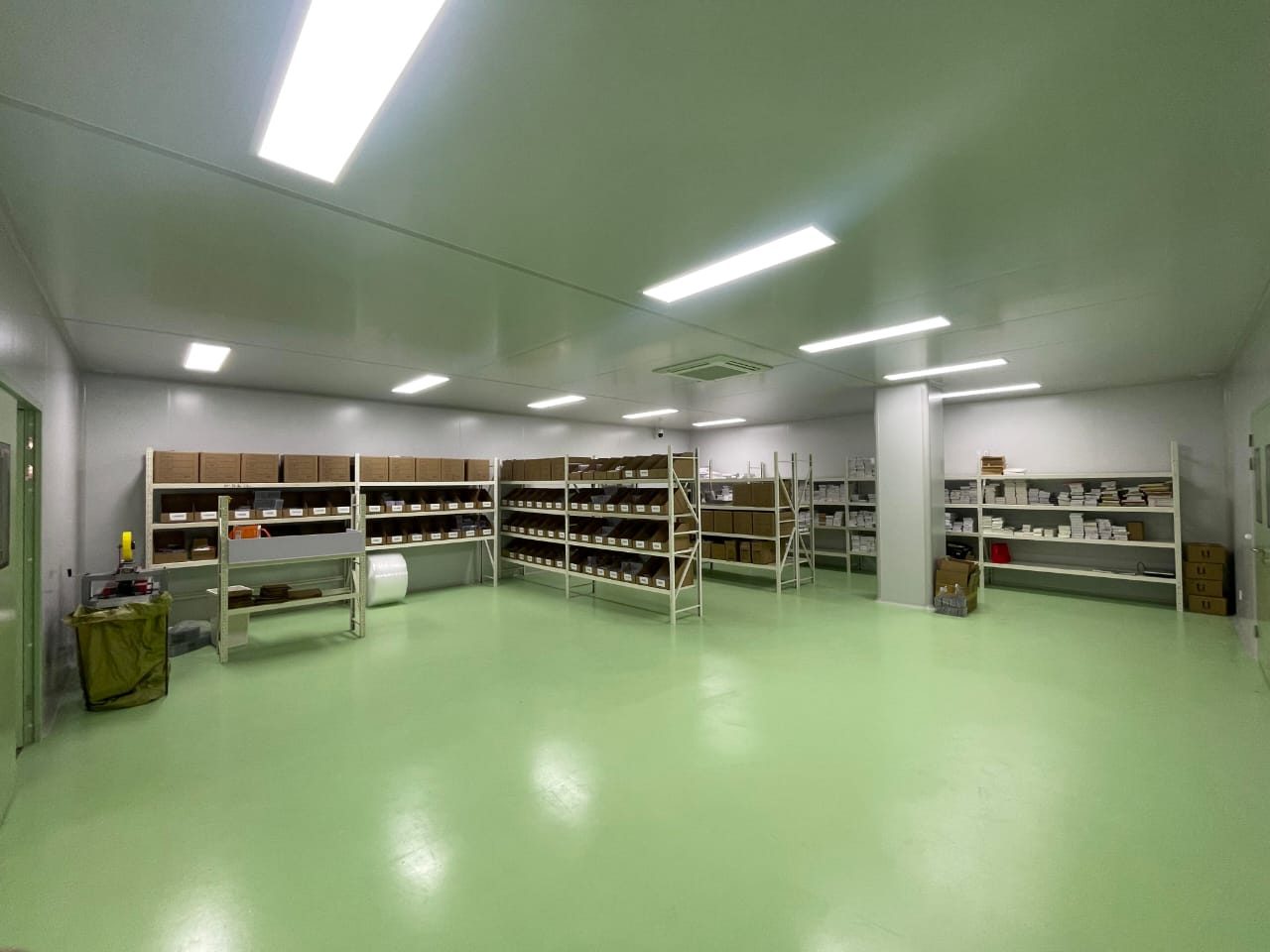 Organized inventory shelves in the Daisy Source lash warehouse